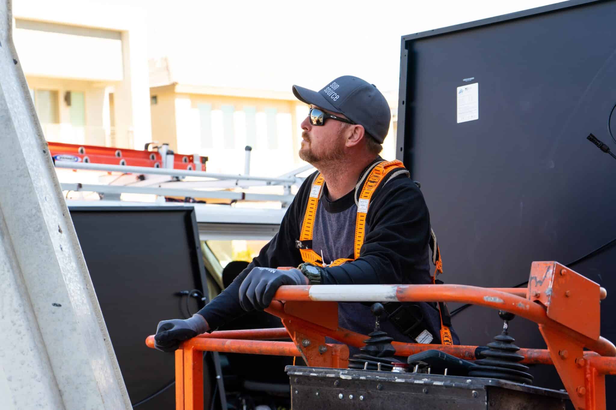 Solar installer on lift